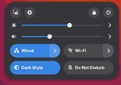 Snelle instellingen in GNOME met de hoofdschuifregelaar voor helderheid van Veld Monitor Controls boven de volumeregelaar